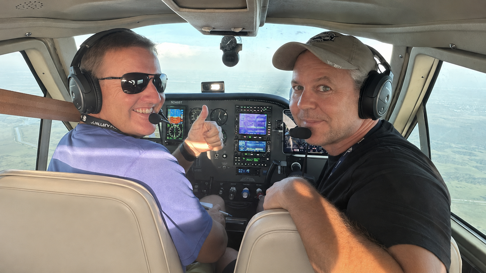 Rivercode founders Jason Natwick and Brian Rudloff flying an aircraft